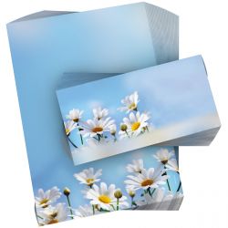 Motivpapier Gänseblümchen DIN A4 – Weiße Gänseblümchen vor hellblauem Himmel vermitteln sofort Frische und gute Laune